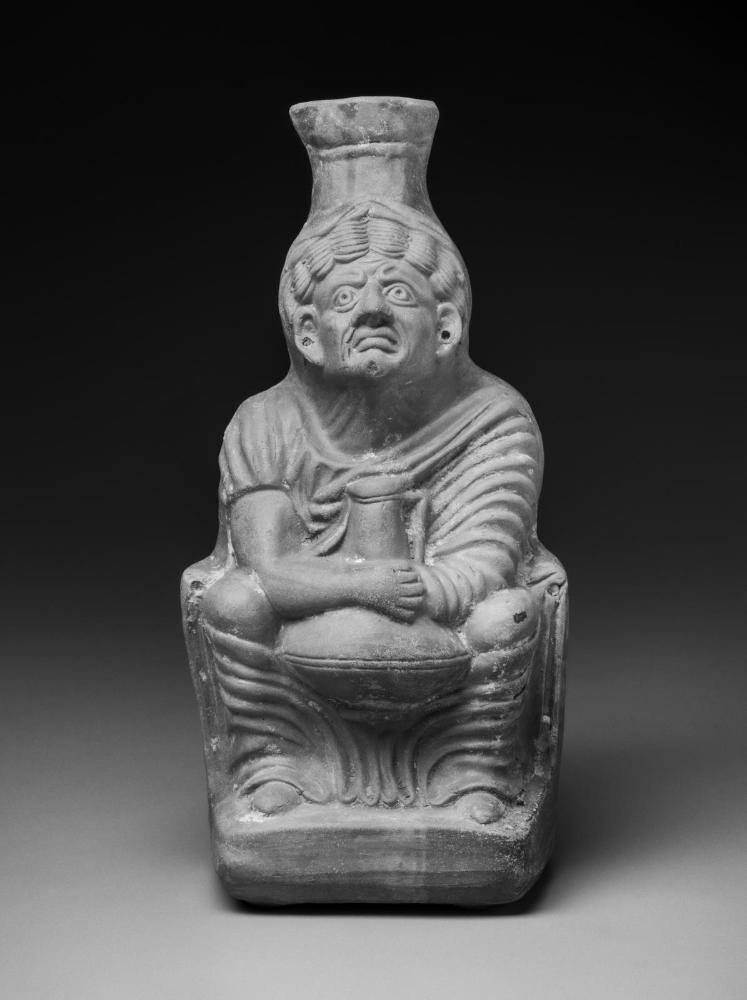 Jug in the shape of a drunken old woman