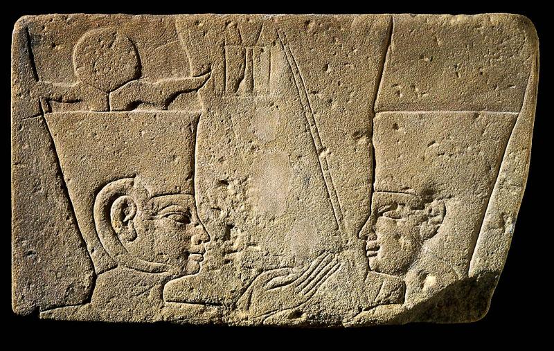 Relief of a king before Amen