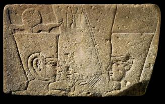 Relief of a king before Amen