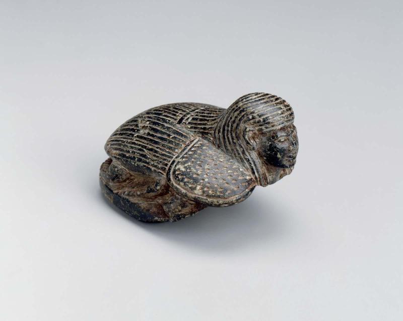 Human headed heart scarab