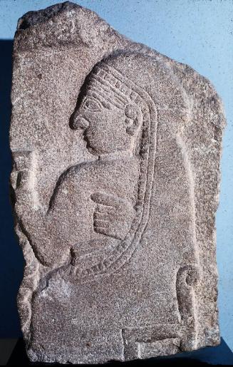 Relief with a seated woman or goddess