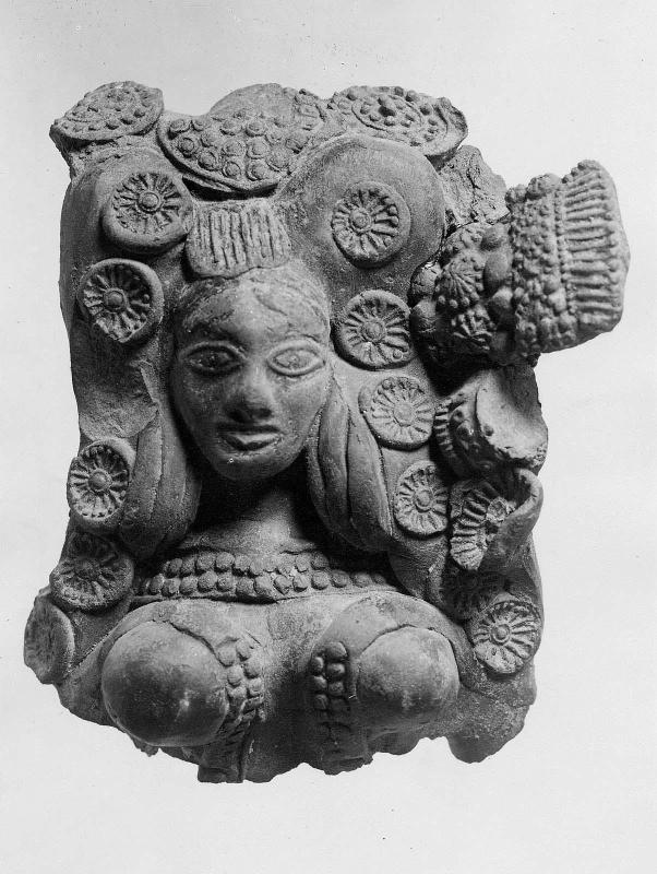Woman's Head with Large Headdress