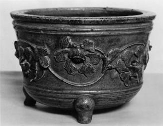 Chinese jar with a band of flower relief