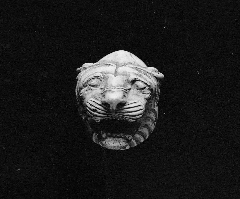 Harness ornament in the shape of a lion