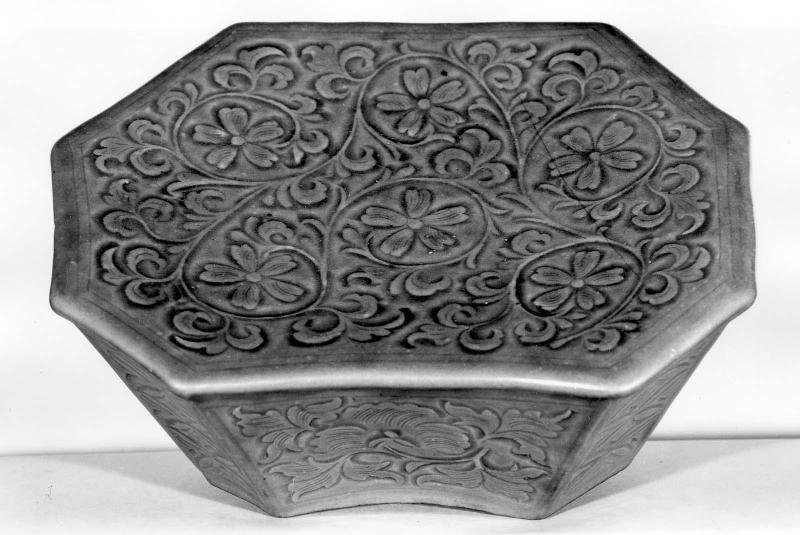 Octagonal pillow with floral design