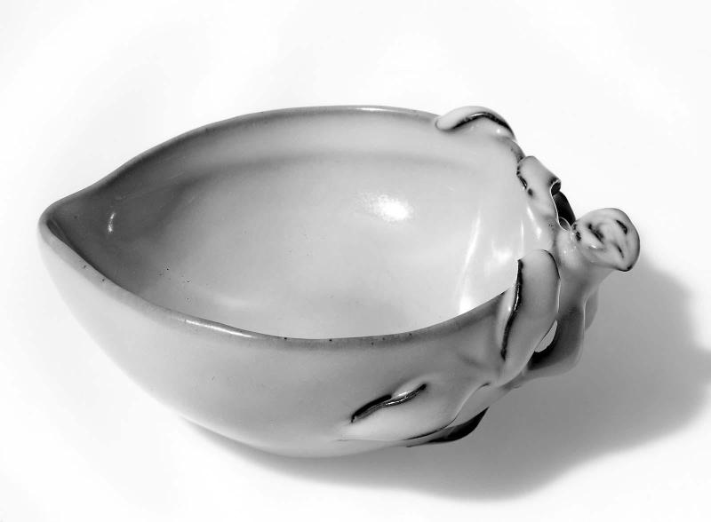 Peach-shaped brushwasher with molded and applied stem and leaves