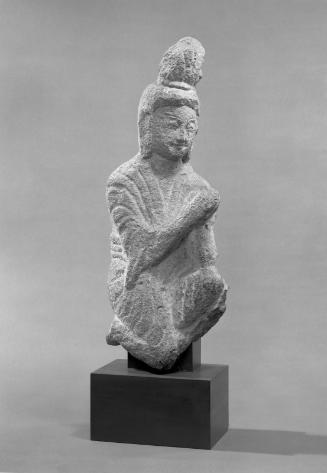 Kneeling figure