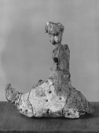 Female deity riding a tortoise