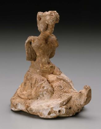 Female deity riding a tortoise