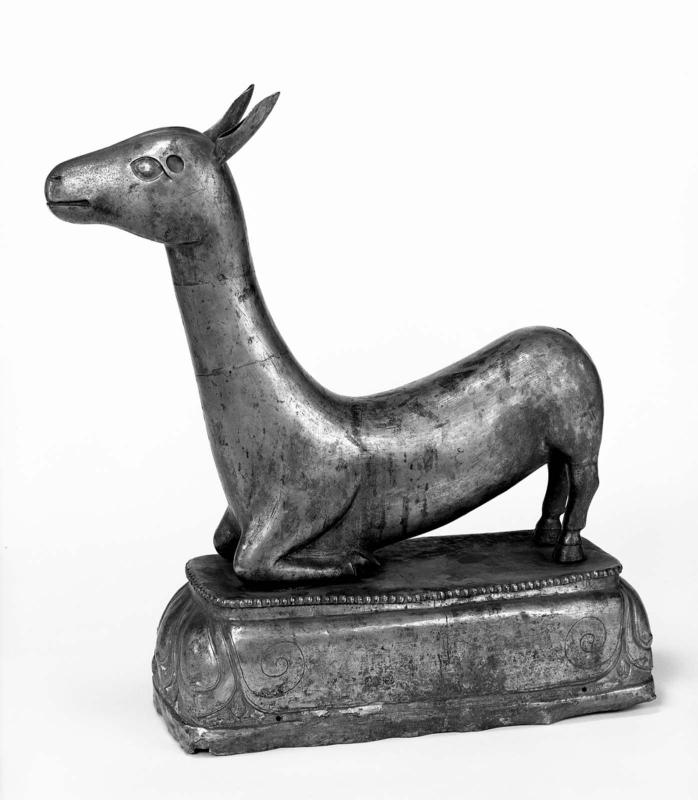 Female Deer Kneeling on Forelegs