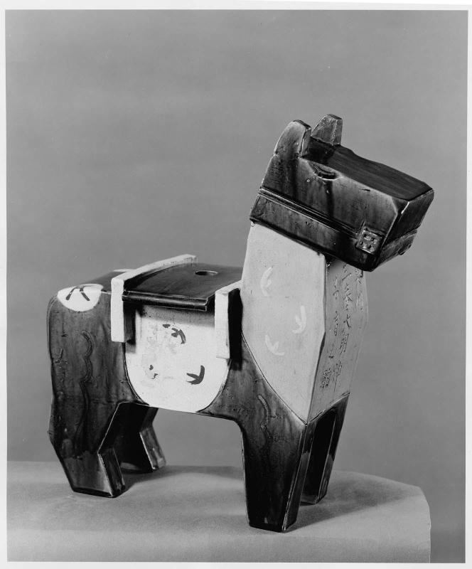 Incense Burner in the Shape of a Horse with a Hole in the Center that Fits on Back of an Animal