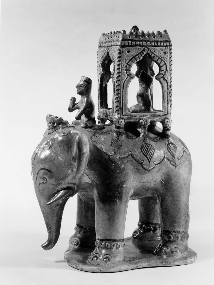 Elephant with driver and rider