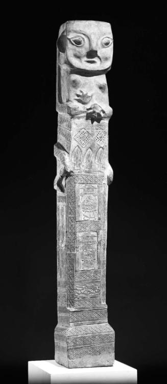 Tile column with squatting human figure