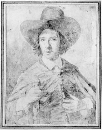 Portrait of a man in a broad-brimmed hat