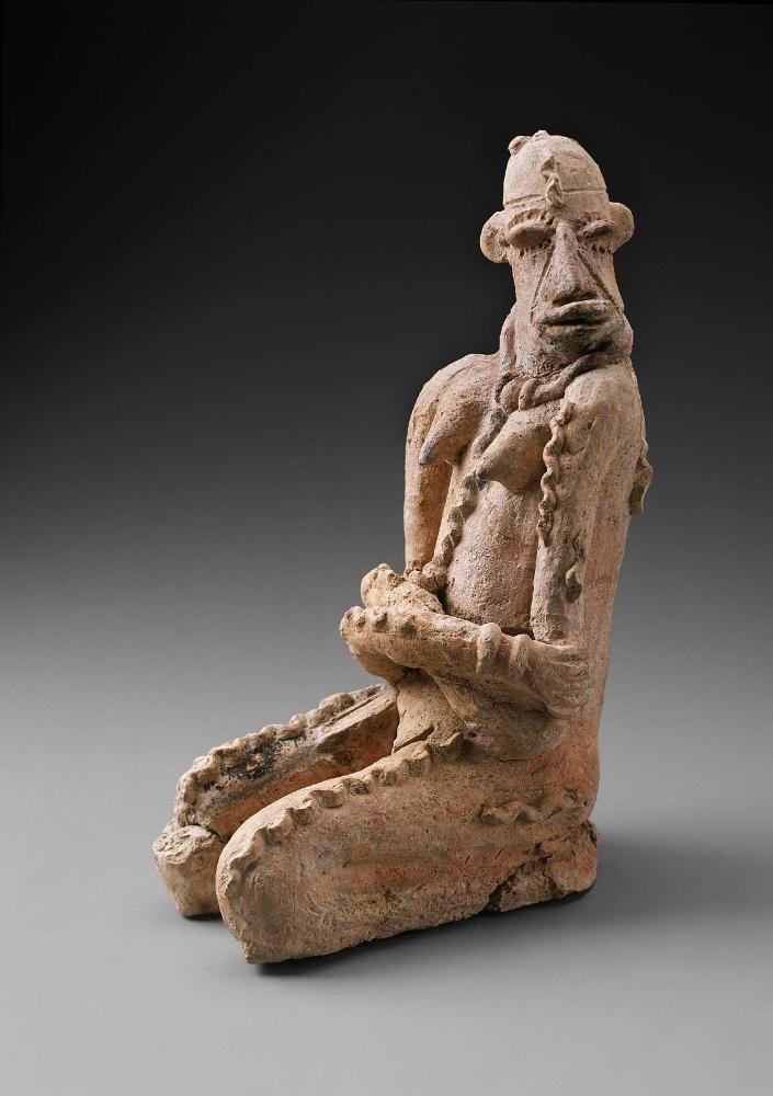 Kneeling Figure