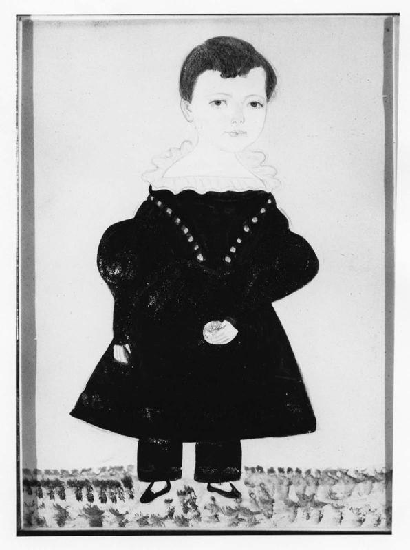 Portrait of a Young Boy Holding a Ball