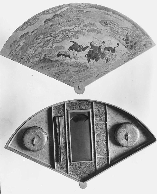 Fan-shaped writing box (suzuribako) with cranes and landscape maki-e decoration