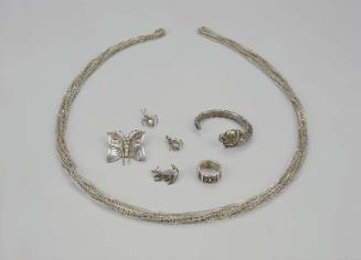 Group shot:  necklace: 1993.842; inside necklace, clockwise from left: 1993.841, 1993.839-40, 1…