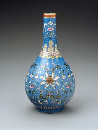 Long-necked ovoid vase with floral scroll over blue ground