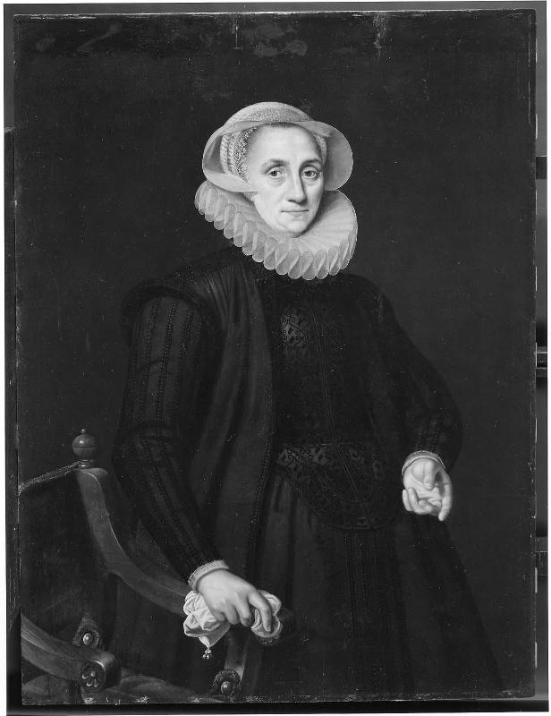 Portrait of a Woman Standing beside a Chair