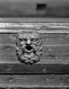 Port main tack fairlead carved as mask