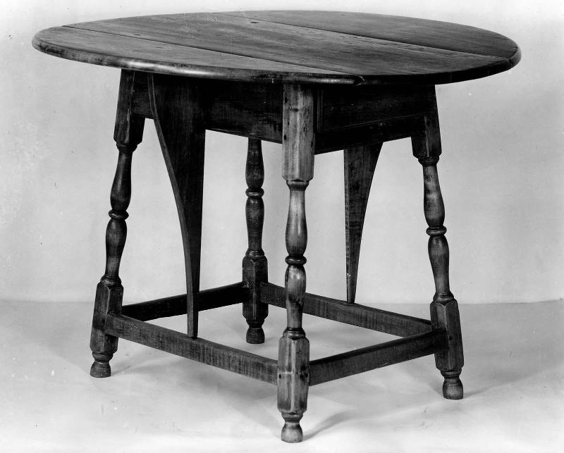 Oval table with falling leaves