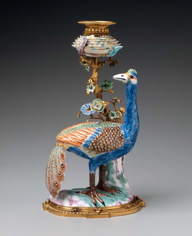Candlestick in the form of a peacock
