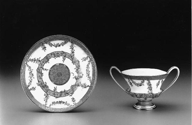 Two-handled cup and saucer