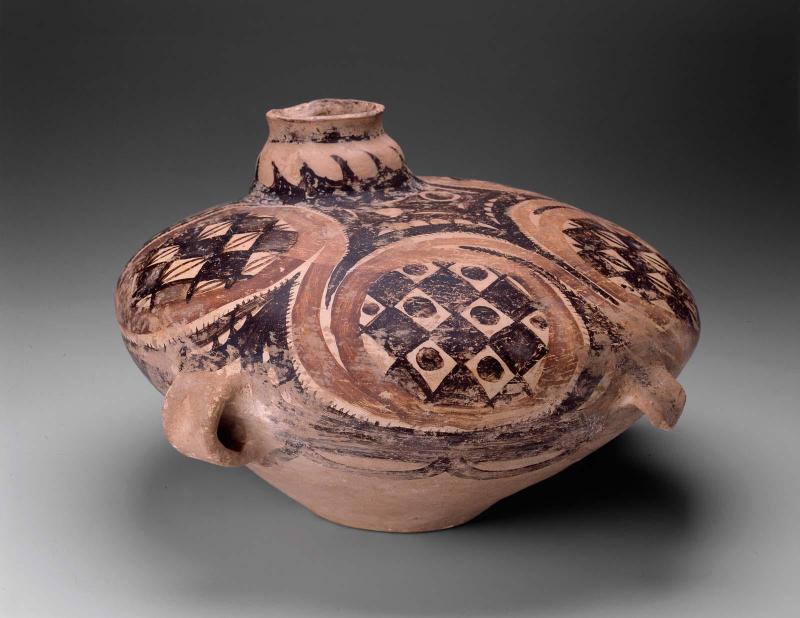 Spouted vessel with handles and lug