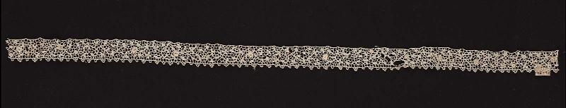 Piece of narrow lace edging