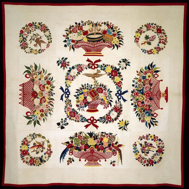 Appliqued bed quilt
