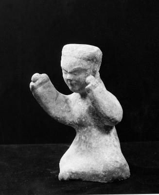 Figure of Seated Musician