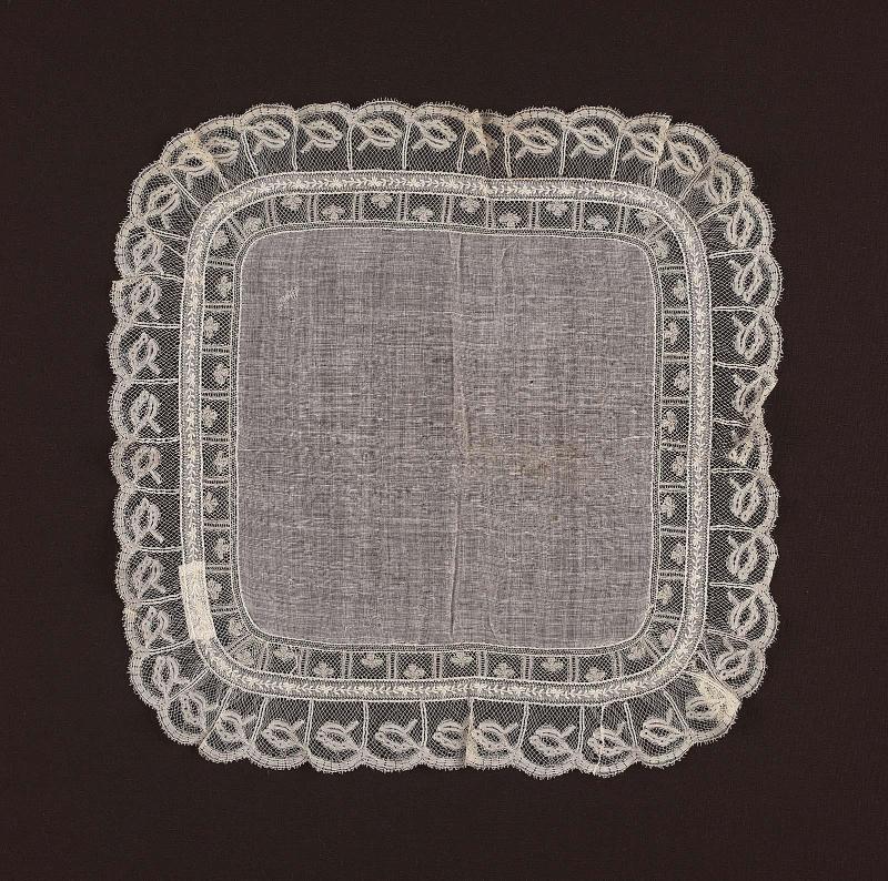 A sheer white linen square handkerchief