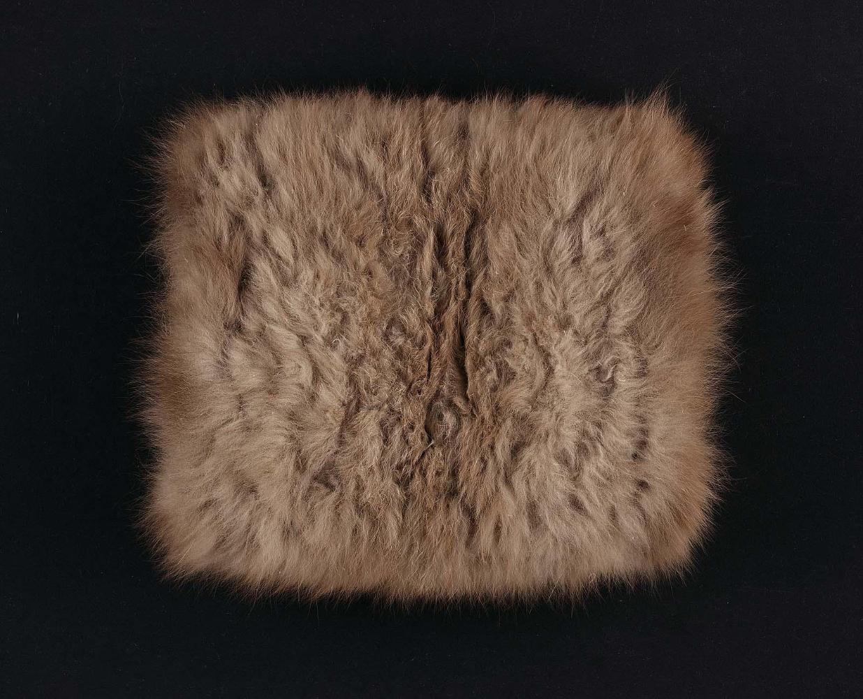 A large muff of grayish-tan fox fur