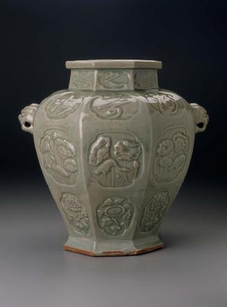 Octagonal wine jar with lion's-head handles and bird-flower decoration