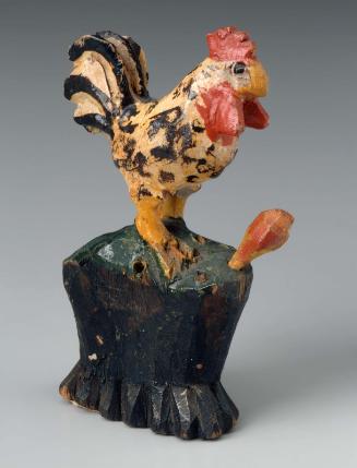 Toy rooster on high base