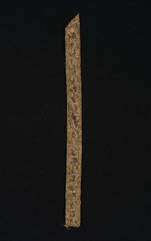 Piece of narrow gold ribbon