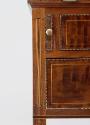 Fluted column and inlay on left side of desk