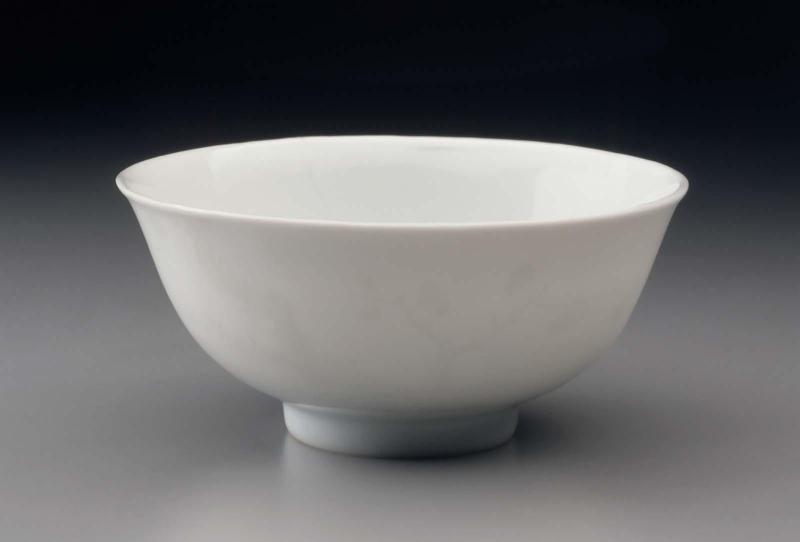 White bowl with white plum blossoms