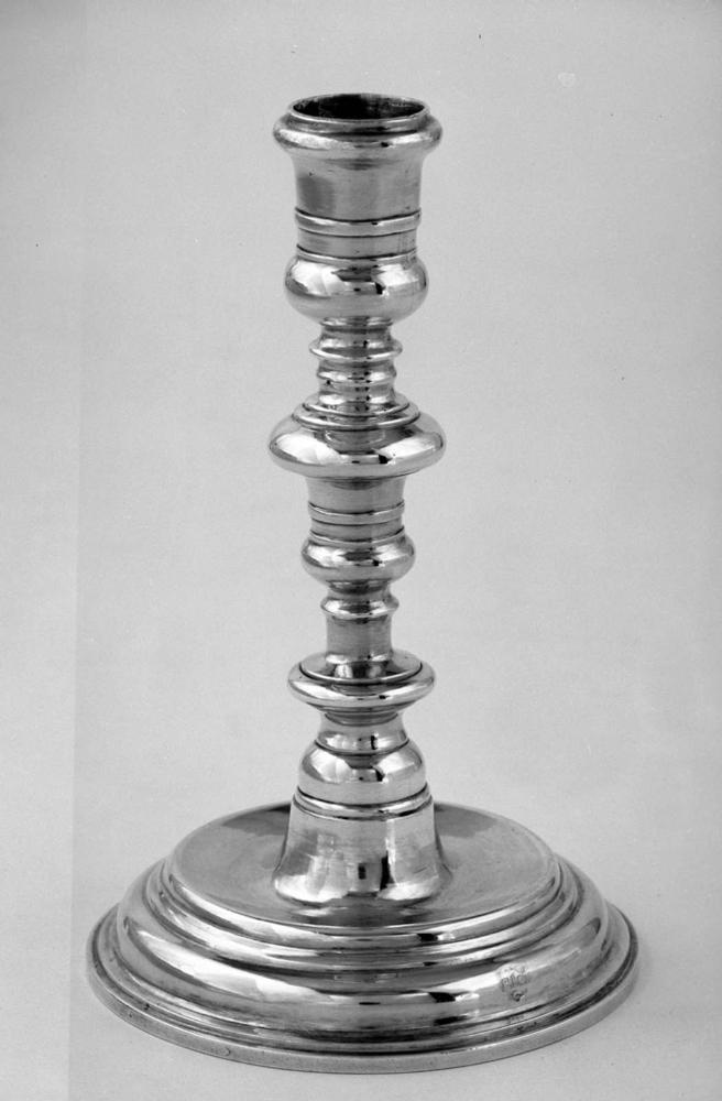 Cast candlestick (one of a pair)