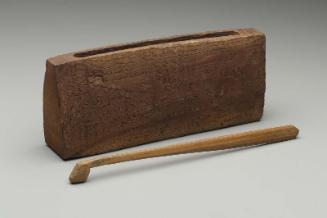 Slit drum (bang) and mallet
