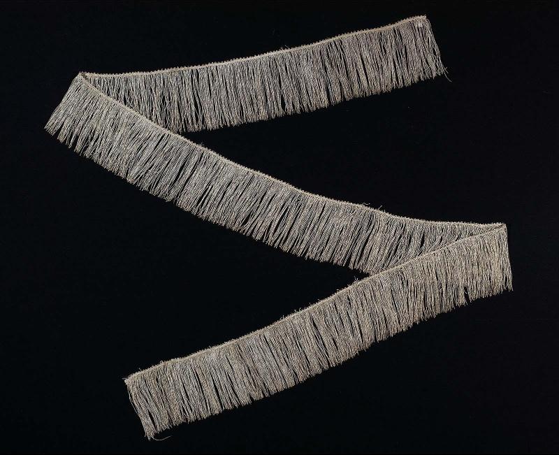 Three pieces of fringe