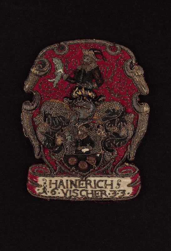 Embroidered heraldic ornament