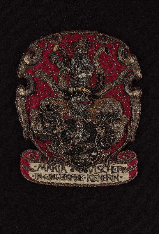 Embroidered heraldic ornament