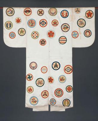 Photographed against black background