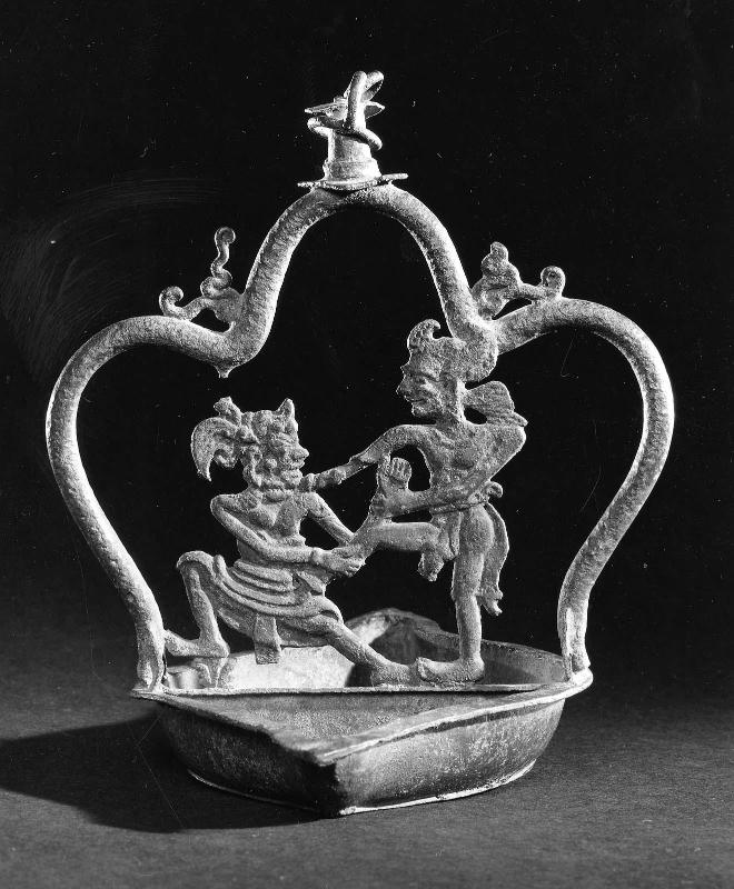 Lamp decorated with two wayang figures