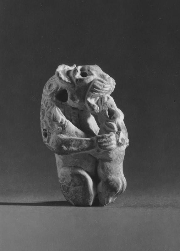Amulet of a lion devouring an antelope