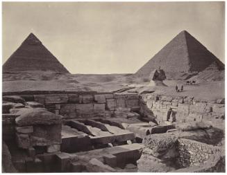 The Giza pyramids of Khufu and Khafra, the Great Sphinx, and the valley temple of Khafra in the foreground, looking northwest