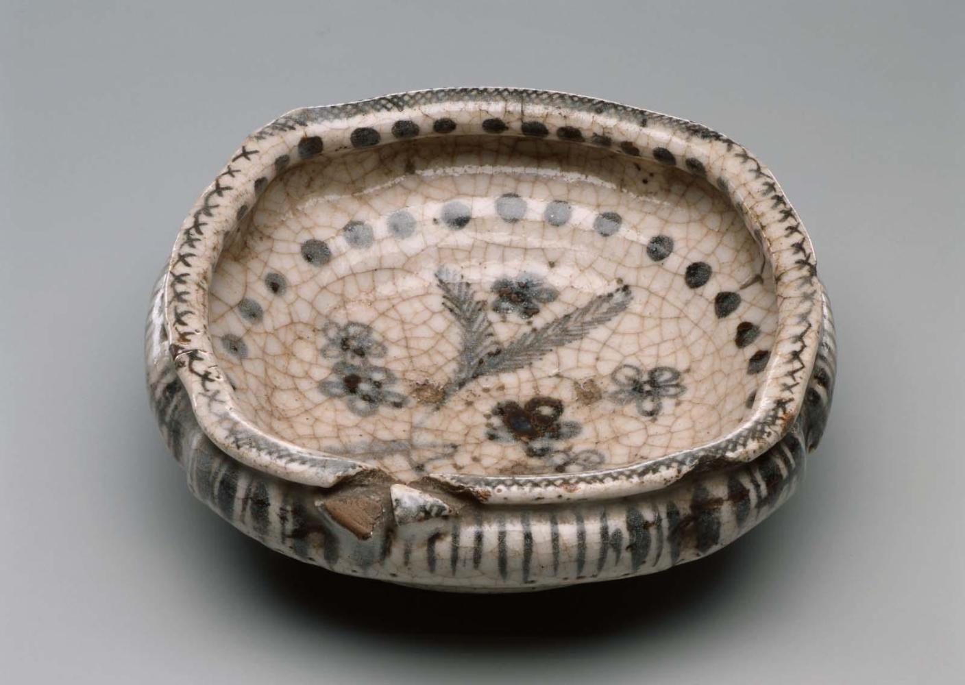 Dish with design of pine and cherry