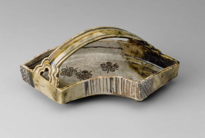 Handled dish with floral design